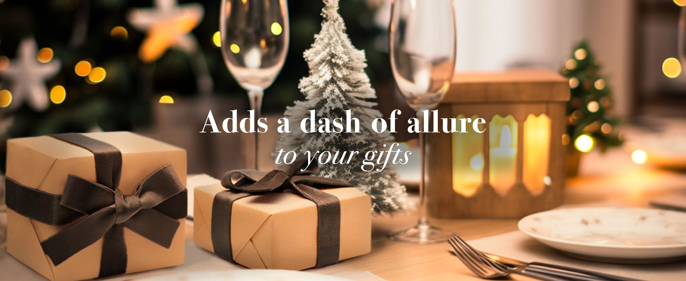 Two kraft-paper gifts tied with dark brown velvet ribbon bows on a festive Christmas table