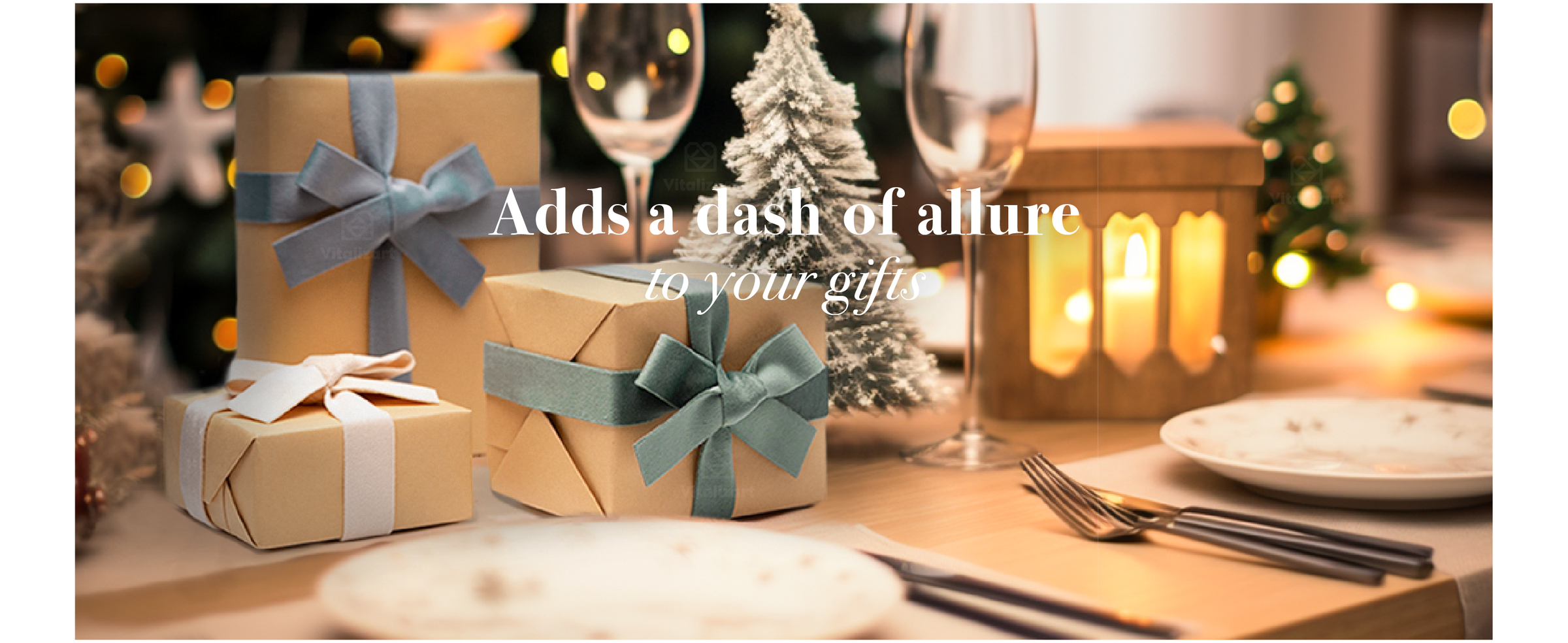Christmas gifts tied with dusty green, blue, and white velvet ribbons on a warmly lit holiday table.