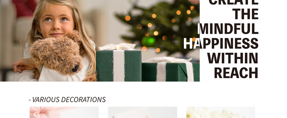 Girl hugging a plush dog beside a green gift wrapped with cream frayed-edge chiffon ribbon