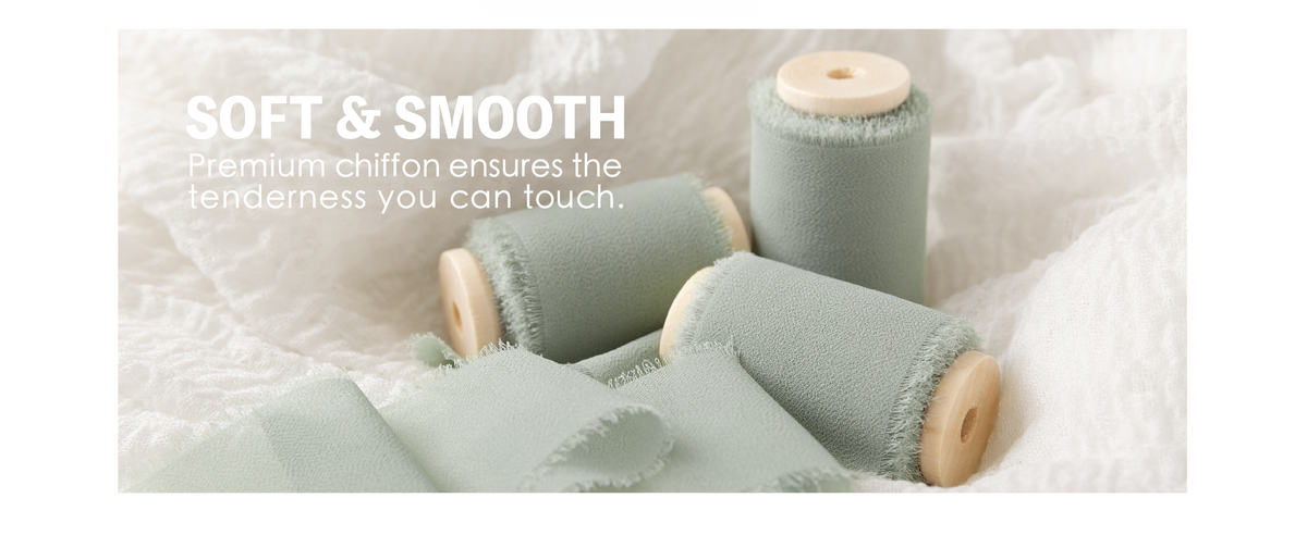 Dusty green chiffon ribbon on three wooden spools, showing soft texture and frayed edges
