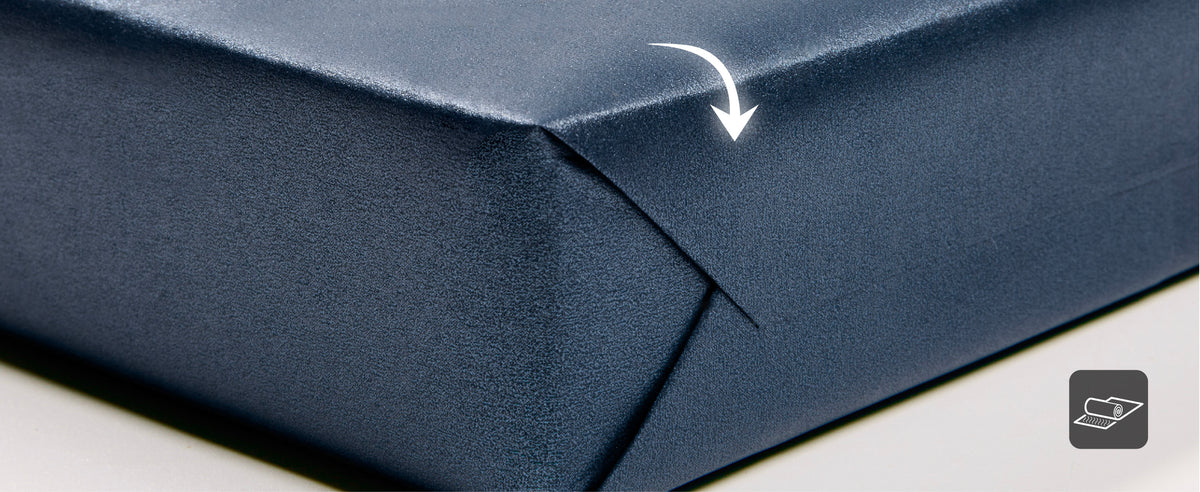Blue wrapping paper rolls with a diagram comparing the 30-inch width to a 17-inch cut section