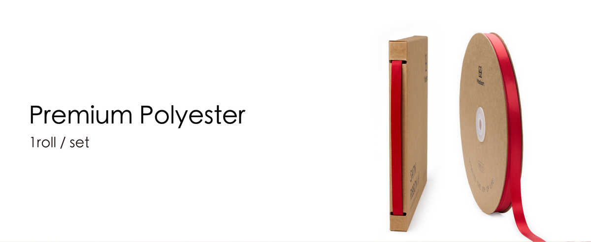 Red polyester satin ribbon shown on a kraft spool and in a matching dispenser box