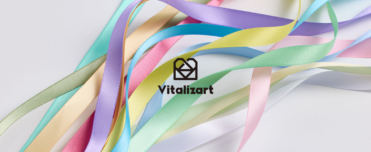 Loose strands from the pastel double-faced satin ribbon set showing a smooth double-faced satin finish