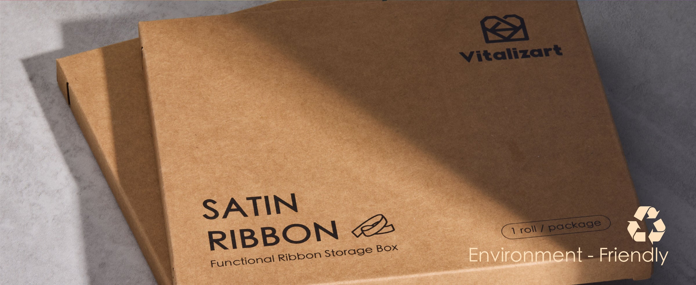 Boxed rolls from the rainbow double-faced satin ribbon set shown with spools and package presentation