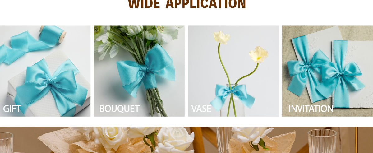 Aqua-blue frayed satin ribbon bows decorating a flower vase and white invitations