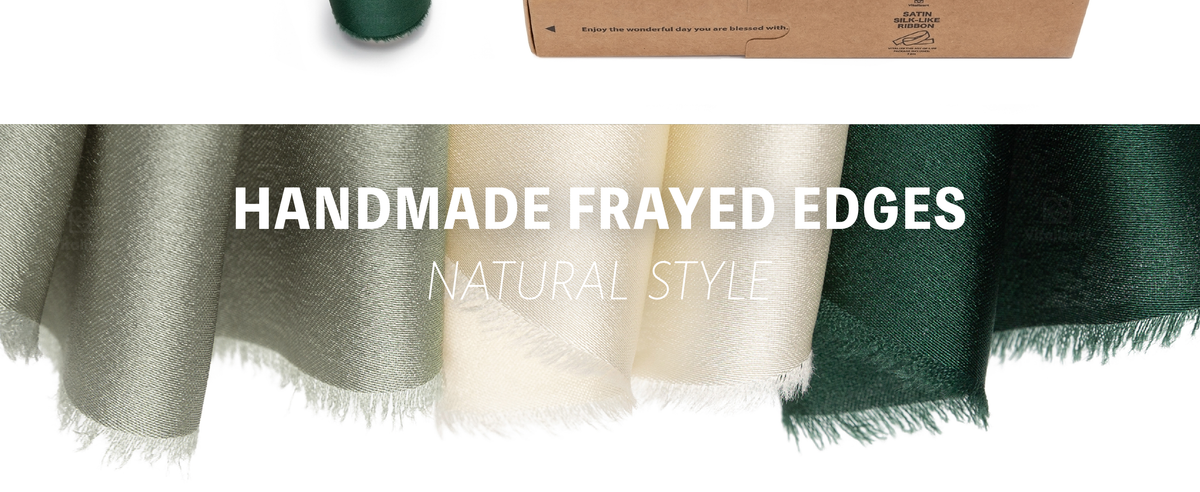 Close-up of glossy dark green, cream, and sage satin ribbons with softly frayed edges
