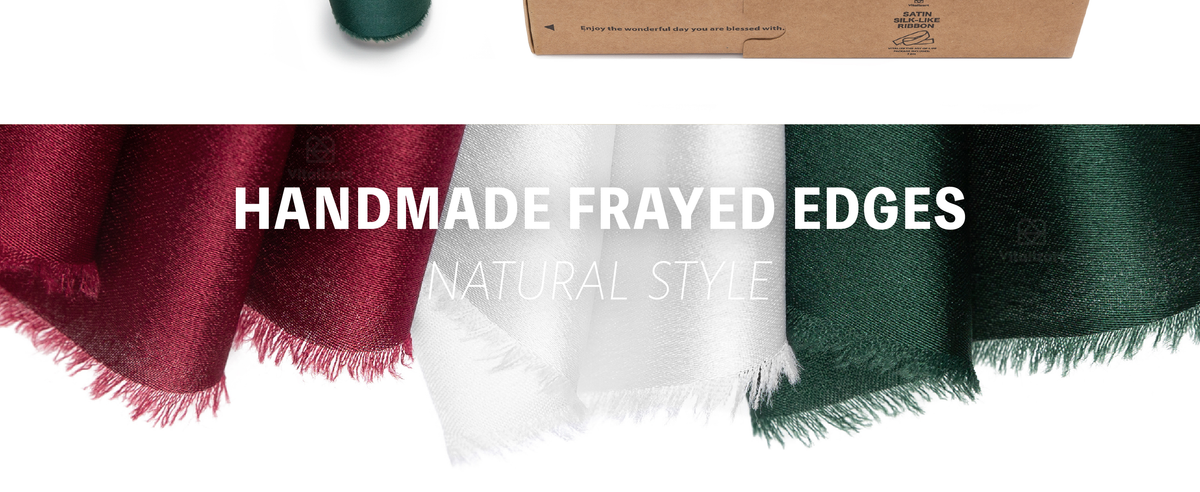 Dark green, white, and burgundy satin-like ribbons in glossy folds with soft handmade frayed edges.