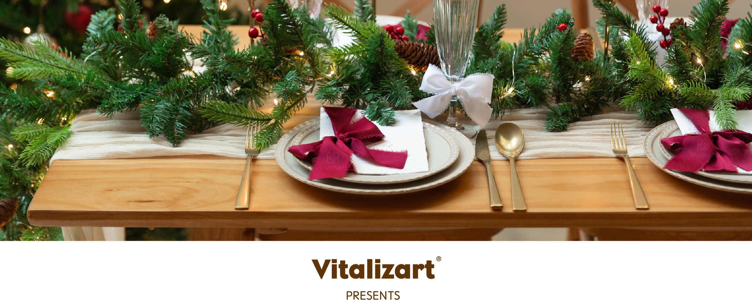 Burgundy, white, and green frayed ribbon bows decorate a candlelit Christmas dining table.