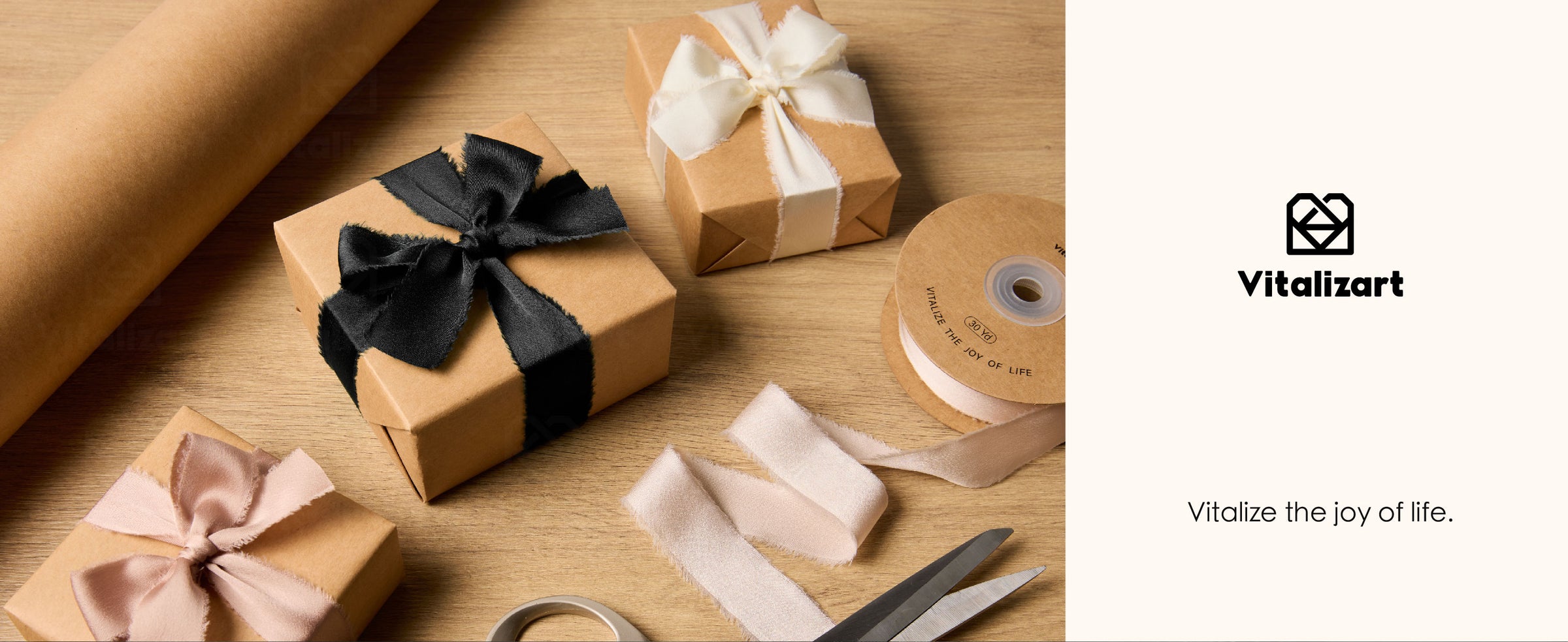 Black frayed satin ribbon tied around a kraft gift box beside ivory and blush ribbon accents.