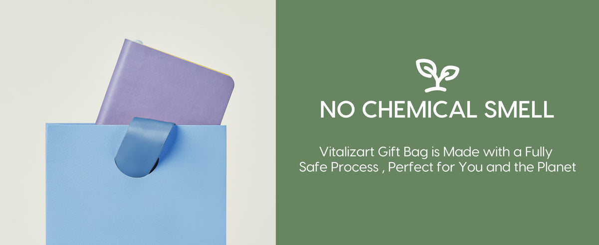 Light blue textured paper gift bag with a blue satin ribbon handle and purple item inside
