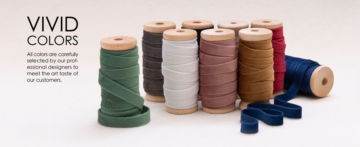 Velvet ribbon rolls displayed together in a coordinated range of vivid colors