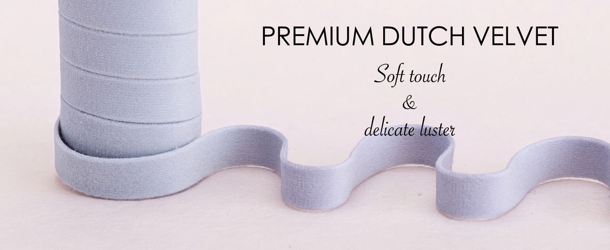 Close-up of the blue and purple velvet ribbon set showing a soft plush velvet surface