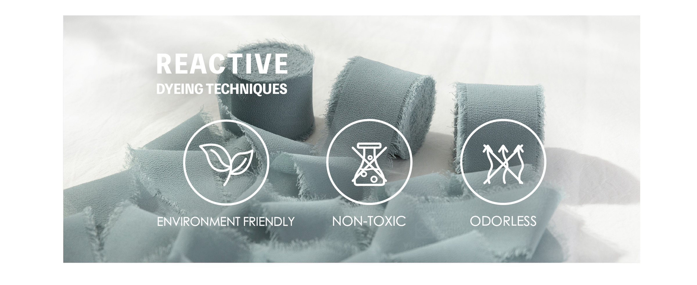 Dusty blue frayed chiffon ribbon with icons labeling environmentally friendly, non-toxic, and odorless dyeing.