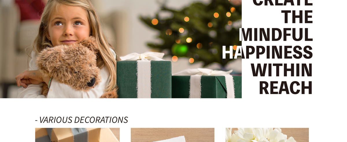 Girl hugging a plush dog beside a green gift wrapped with cream-white frayed chiffon ribbon.