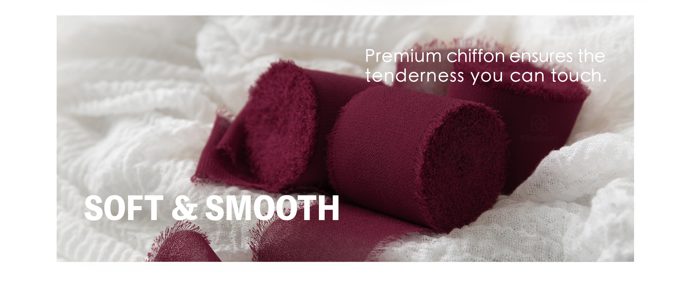 Burgundy chiffon ribbon rolls with soft woven texture and feathery edges on white fabric.