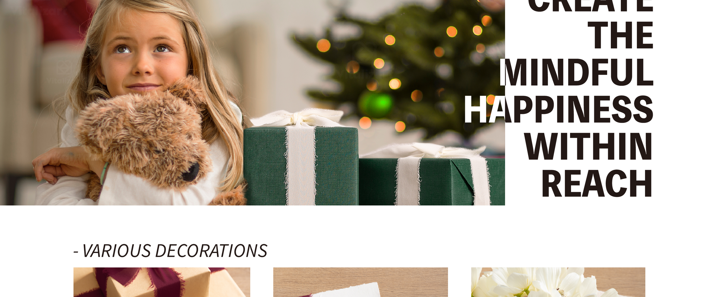 Young girl hugging a plush dog beside a green gift wrapped with pale fringed chiffon ribbon.