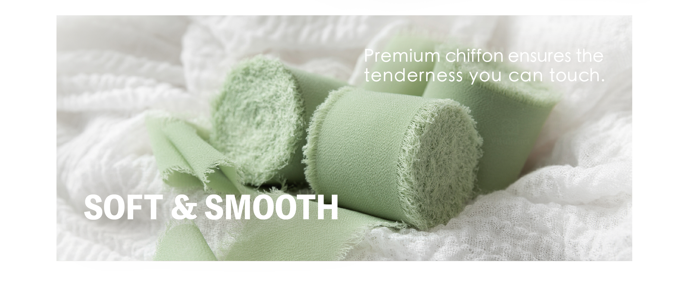 Sage green chiffon ribbon rolls with smooth woven surfaces and softly frayed edges on white fabric