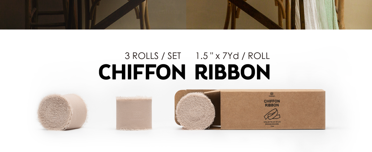 Three nude beige chiffon ribbon rolls with frayed edges beside an open kraft box.