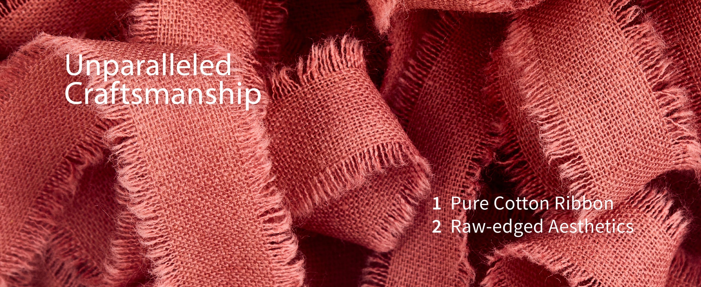 Close-up of terracotta cotton ribbon showing its open weave, soft folds, and raw fringed edges.