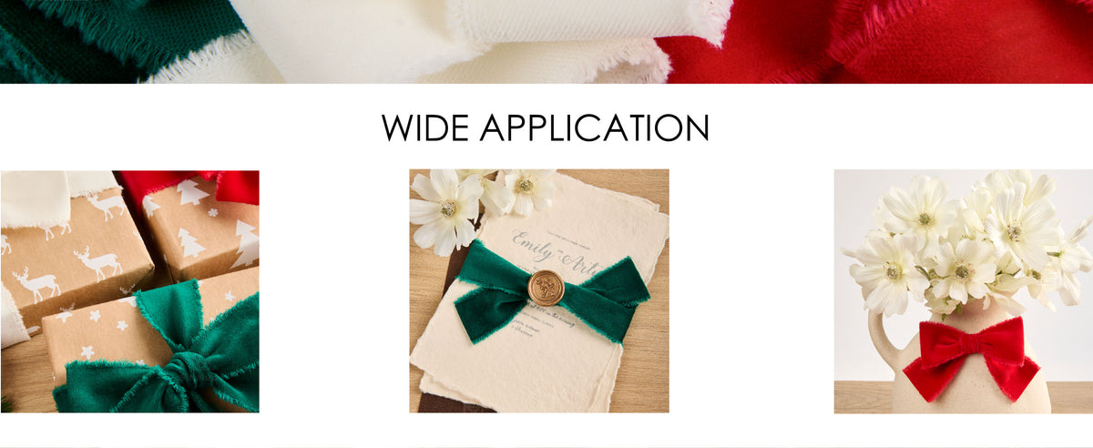 Christmas velvet ribbons decorate gift boxes, a sealed invitation, and a white flower vase.