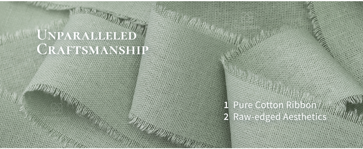 Close-up of dusty green woven cotton ribbon in loose folds with soft, raw fringed edges.