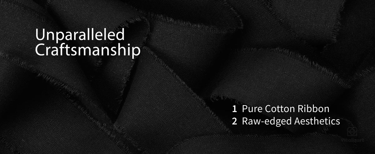 Close-up of overlapping black cotton ribbon showing its woven texture and softly frayed raw edges
