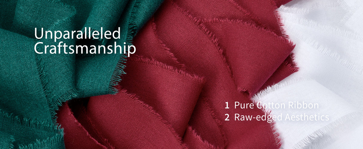 Layered green, red, and white cotton ribbons with a woven texture and intentionally frayed raw edges.