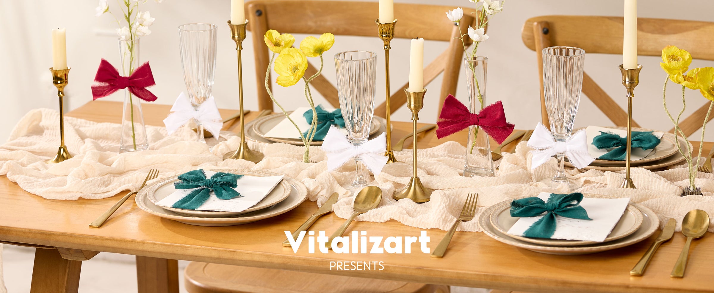 Green, red, and white frayed ribbon bows decorate napkins, vases, and stemware on a festive dining table.