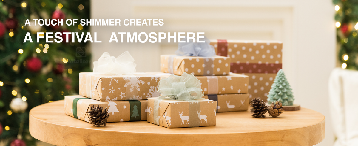 Pale blue, green, and cream sheer ribbon bows decorate kraft-paper gifts beside a Christmas tree