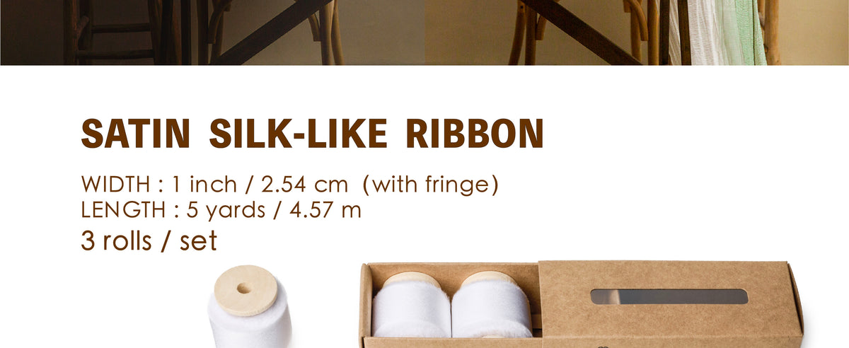 Three white satin-like ribbon rolls with frayed edges, each 1 inch wide and 5 yards long, in a kraft box.