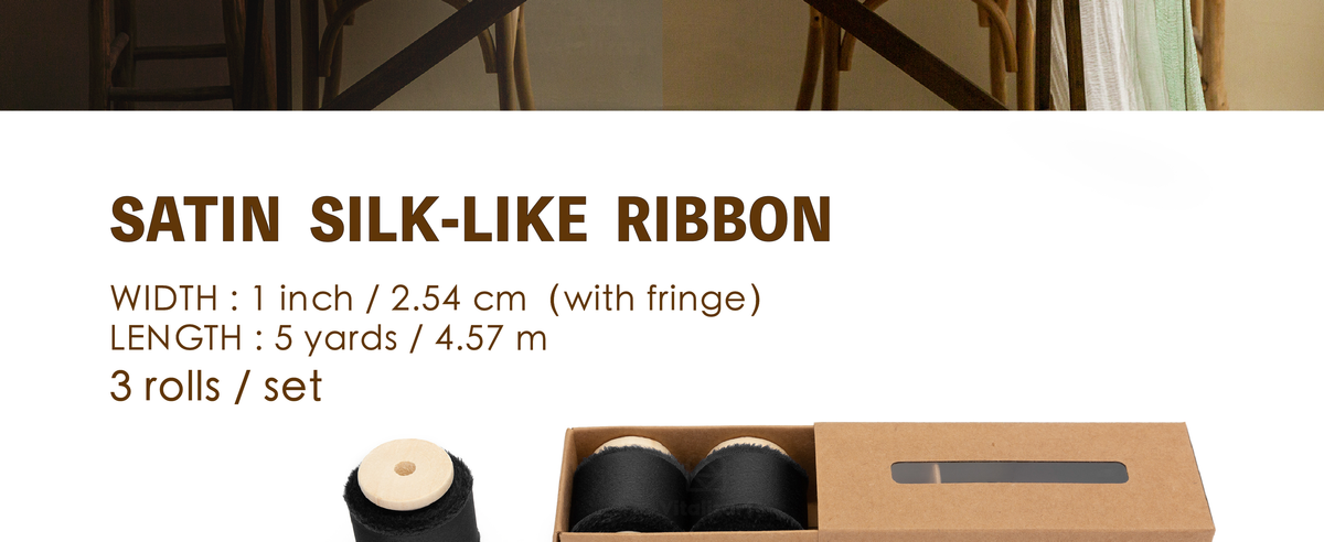 Three rolls of one-inch black satin-like frayed ribbon on wooden spools with kraft box
