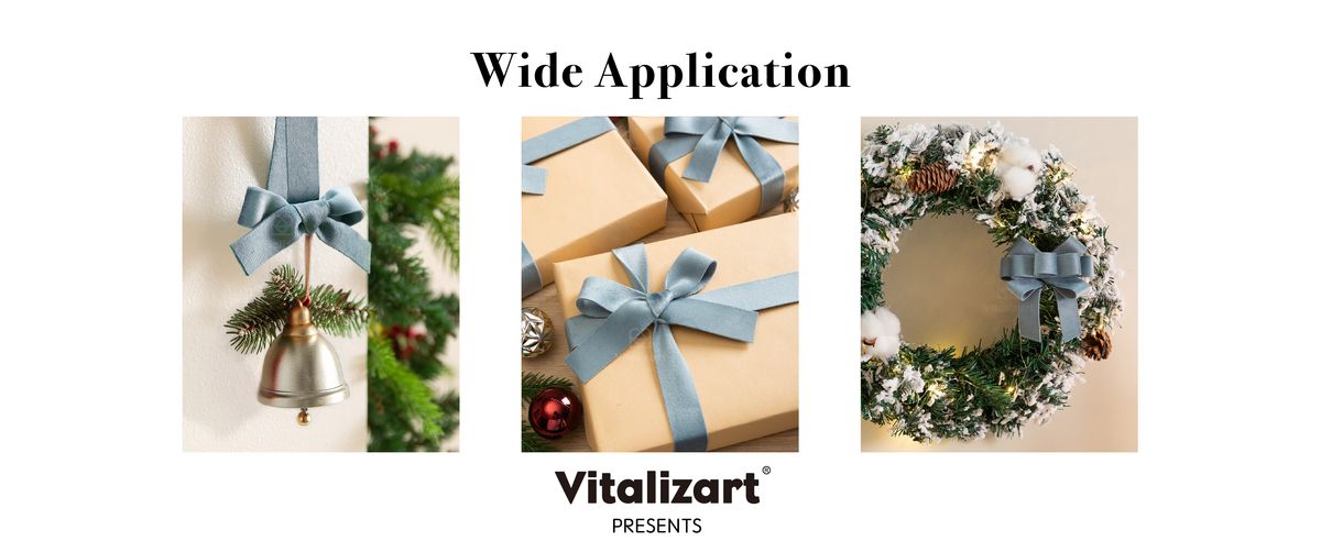Dusty blue velvet ribbon used for a hanging bell, wrapped gifts, and a snowy illuminated wreath.