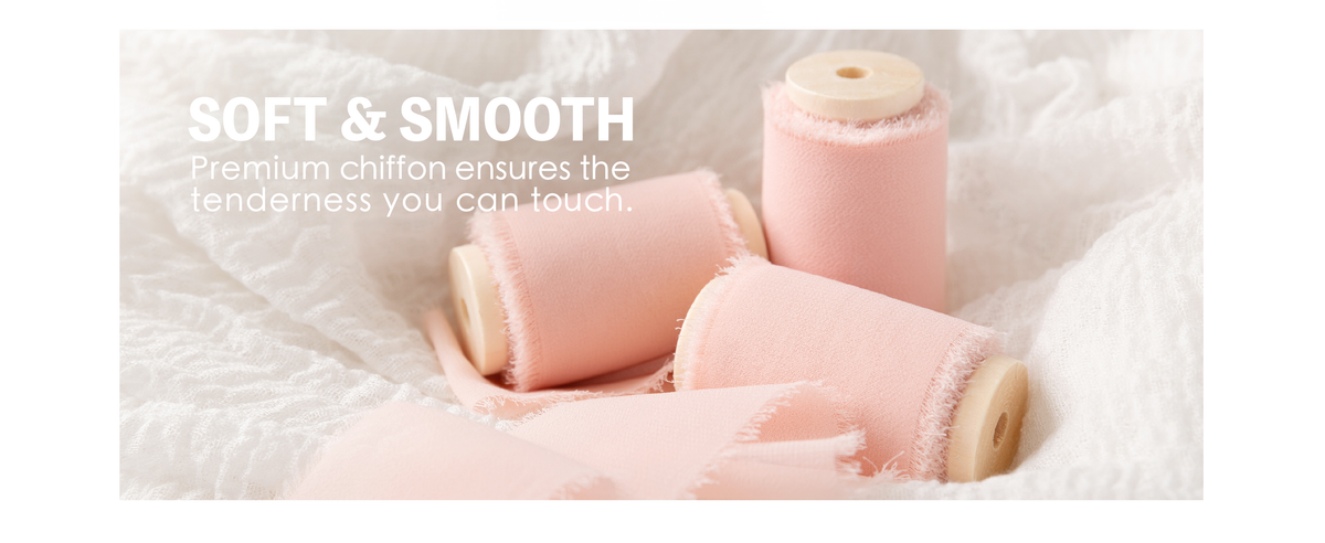 Pale pink chiffon ribbon with soft woven texture and frayed edges wound on three wooden spools.
