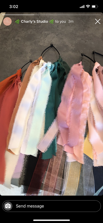 Assorted frayed ribbons displayed in Charly's Studio