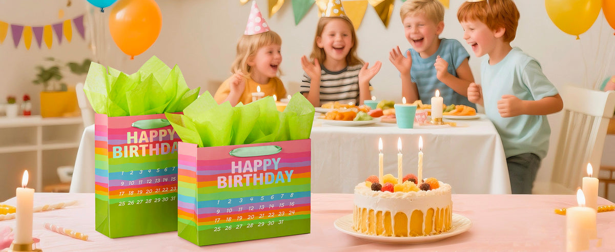 Two rainbow calendar gift bags with lime tissue beside a candlelit cake at a children's party