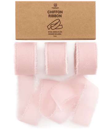Blush pink chiffon ribbon roll on a white background