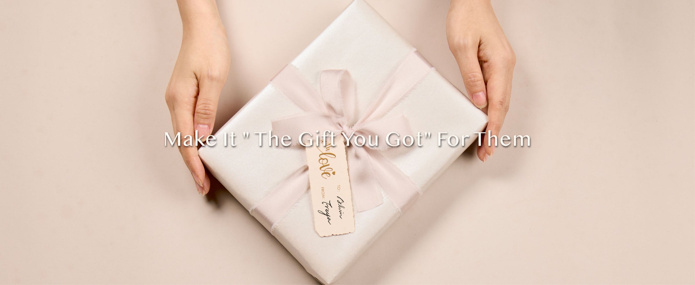 Pearly white wrapping paper beside its kraft box, with recycling and FSC symbols