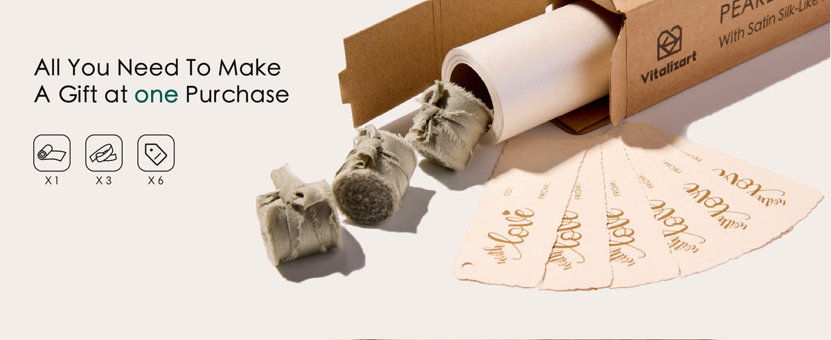 White wrapping paper set with one pearly roll, three sage ribbons and six cream gift tags