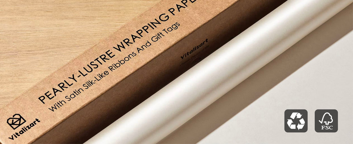 Boxed pearly white wrapping paper set displayed with recycling and FSC symbols