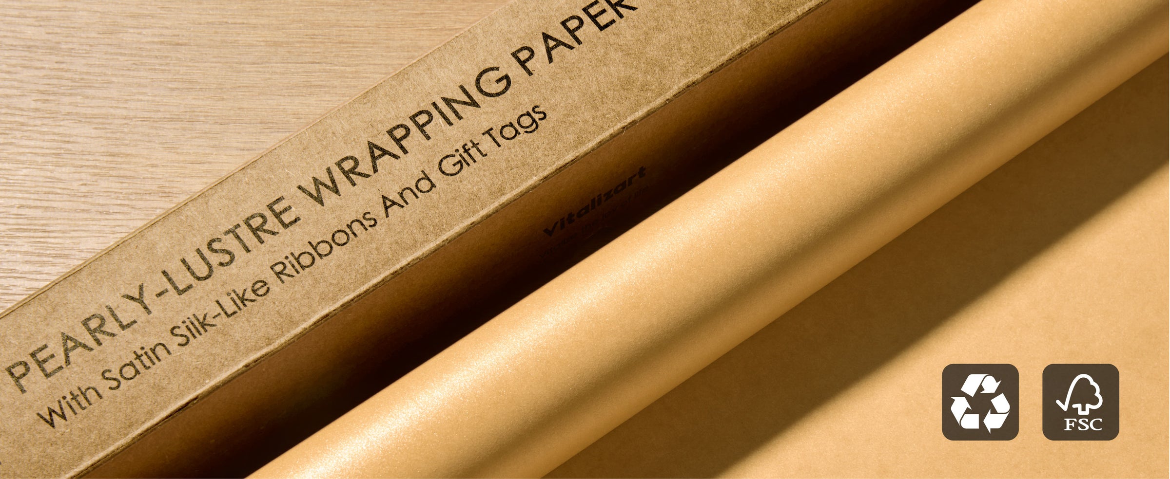 Gold pearly wrapping paper detail panel describing recyclable paper and water-based ink
