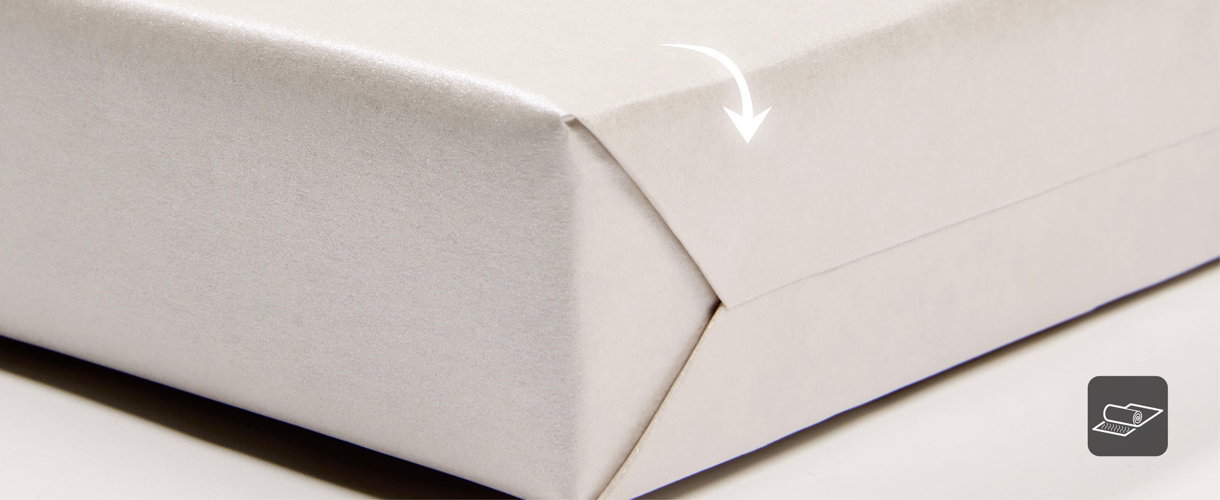 Pearly white wrapping paper rolls with a diagram comparing 17-inch width to a 30-inch bat