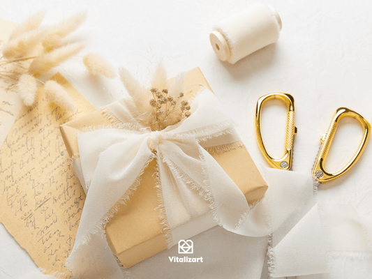 Cream-white chiffon ribbon on a wooden spool