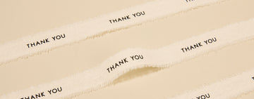 Ivory frayed ribbon printed with Thank You for custom orders