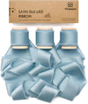 Dusty blue silk satin ribbon on a wooden spool