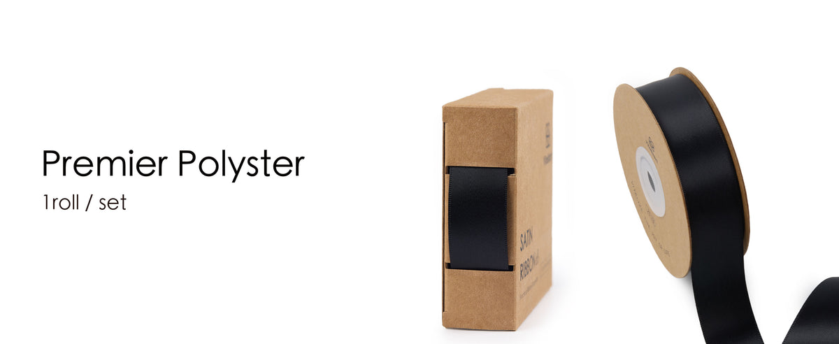 Black polyester satin ribbon shown on a cardboard spool and inside its matching dispenser box.