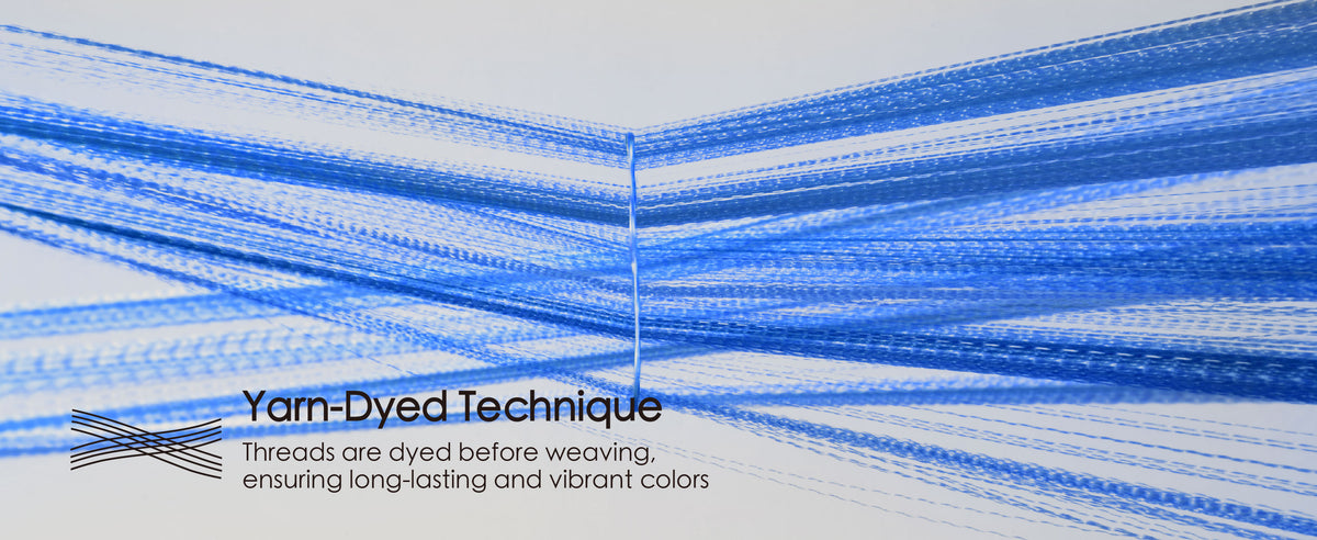 Separated blue ribbon threads converge to illustrate the yarn-dyed weaving technique