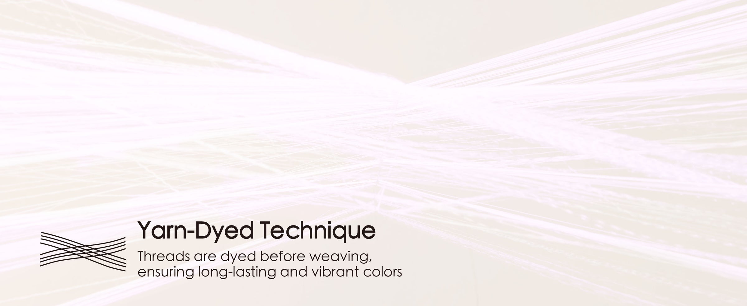 Fine pale pink ribbon threads converge to illustrate the yarn-dyed weaving technique