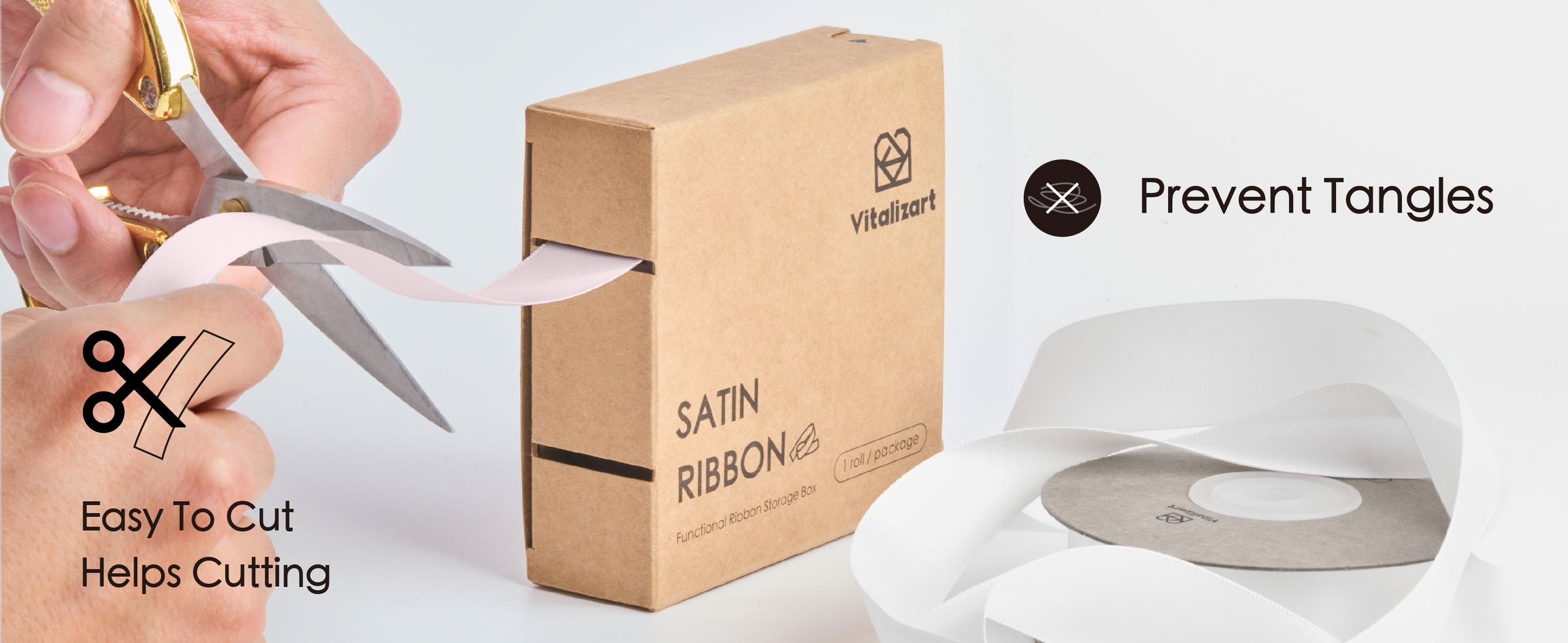 Light pink satin ribbon feeds from a cardboard dispenser as gold-handled scissors cut it.