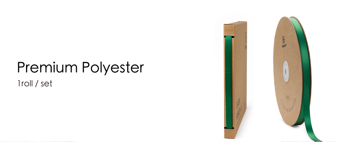 Green polyester satin ribbon shown in a slim kraft dispenser and on a round cardboard spool.