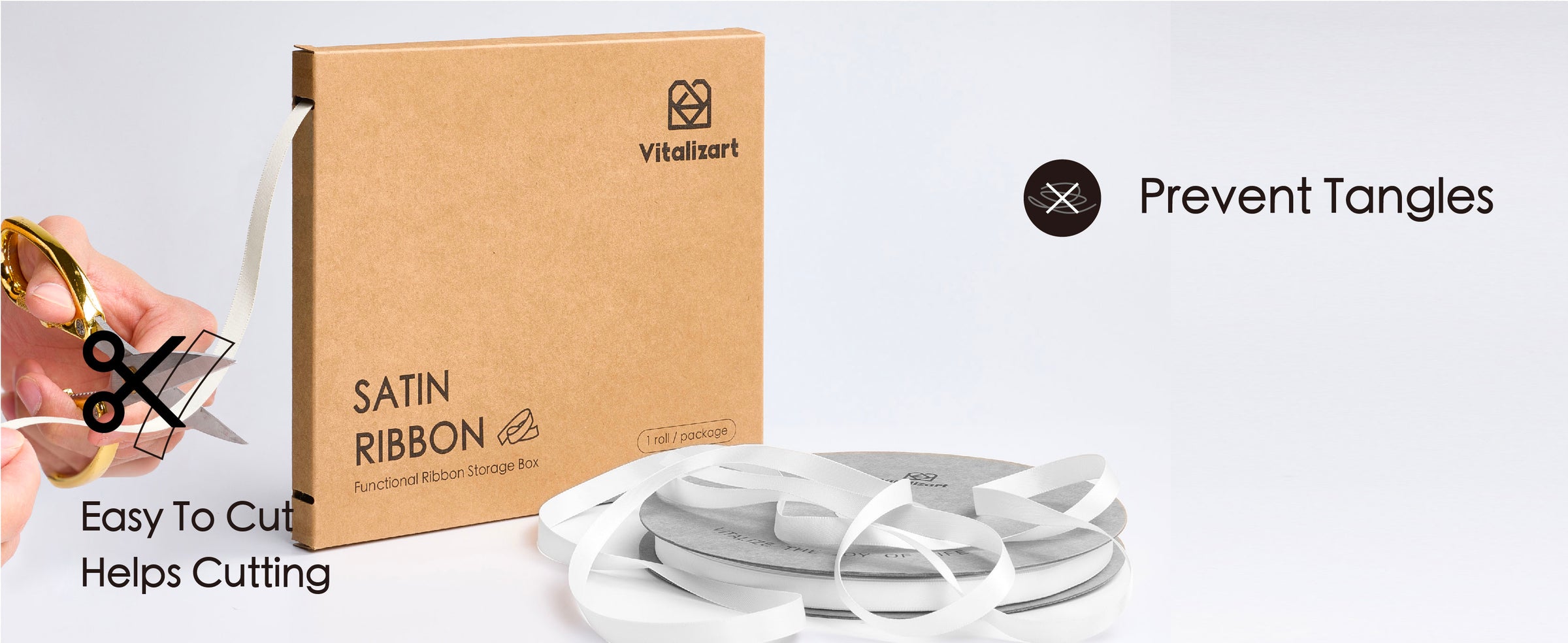 Ivory satin ribbon feeds from a kraft dispenser box as a hand cuts it with scissors